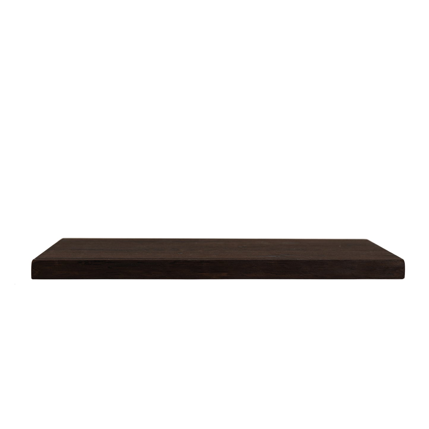 Side view of solid dark oak floating shelf showing thickness